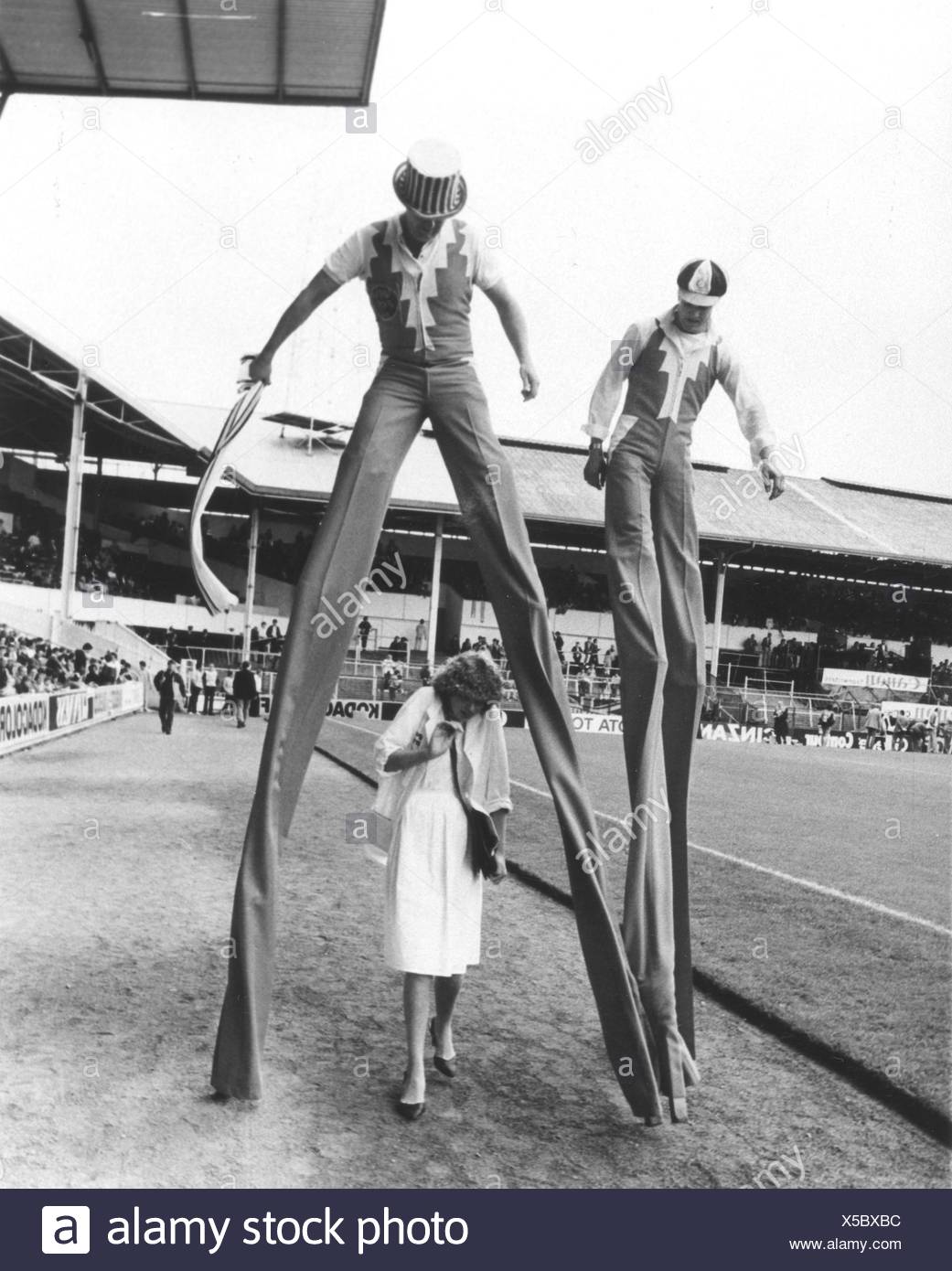 Man On Stilts Black and White Stock Photos & Images - Alamy