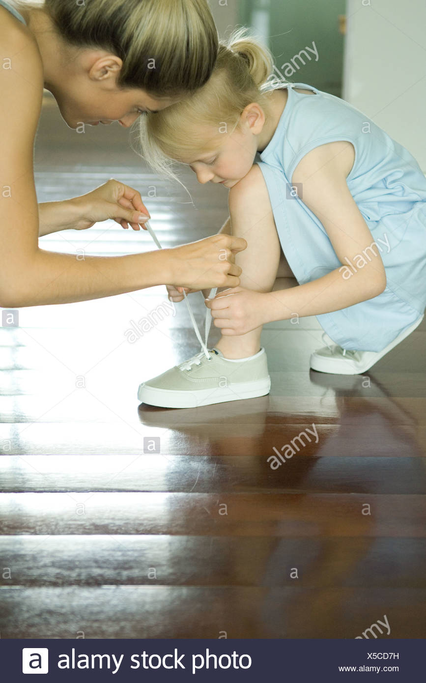 View of Kid Tying Shoe Laces High Resolution Stock Photography and Images - Alamy