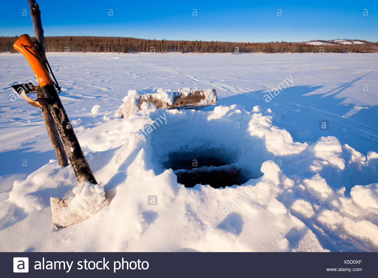 Ice Fishing Hole Stock Photos & Ice Fishing Hole Stock Images Alamy
