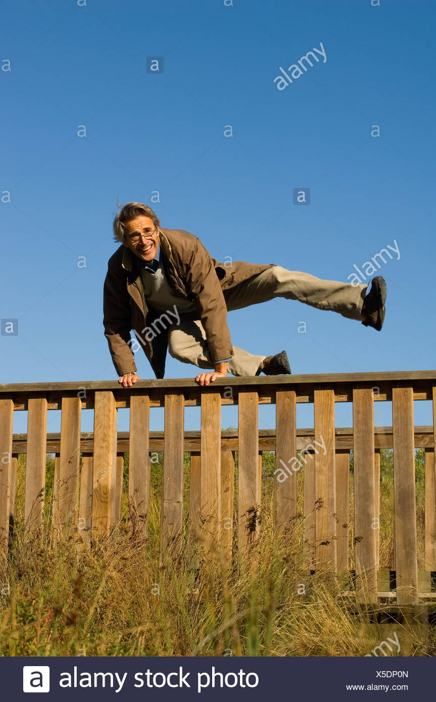 Jumping Over The Fence Stock Photos & Jumping Over The Fence Stock