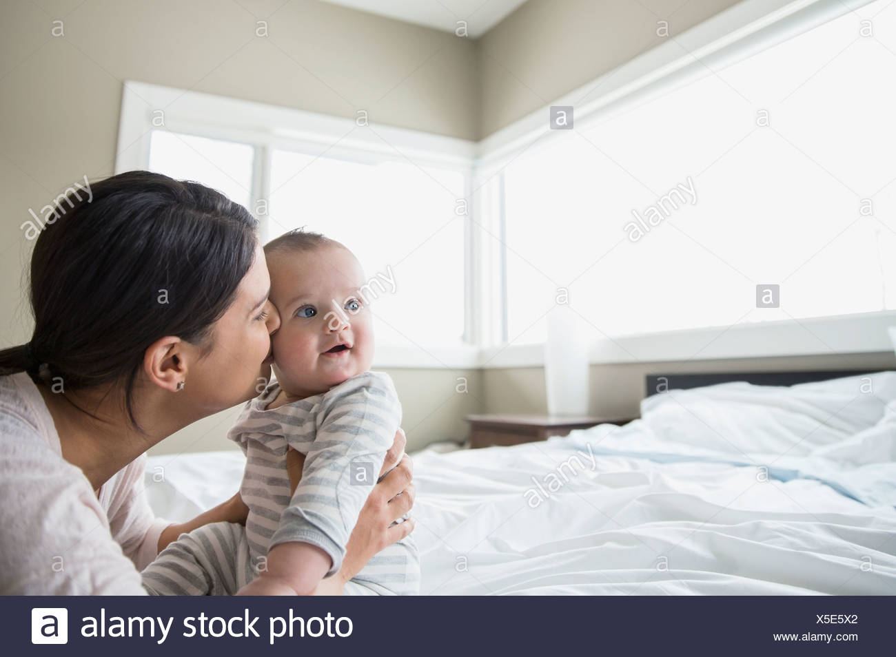Mother Kissing Baby Stock Photos & Mother Kissing Baby Stock Images Alamy