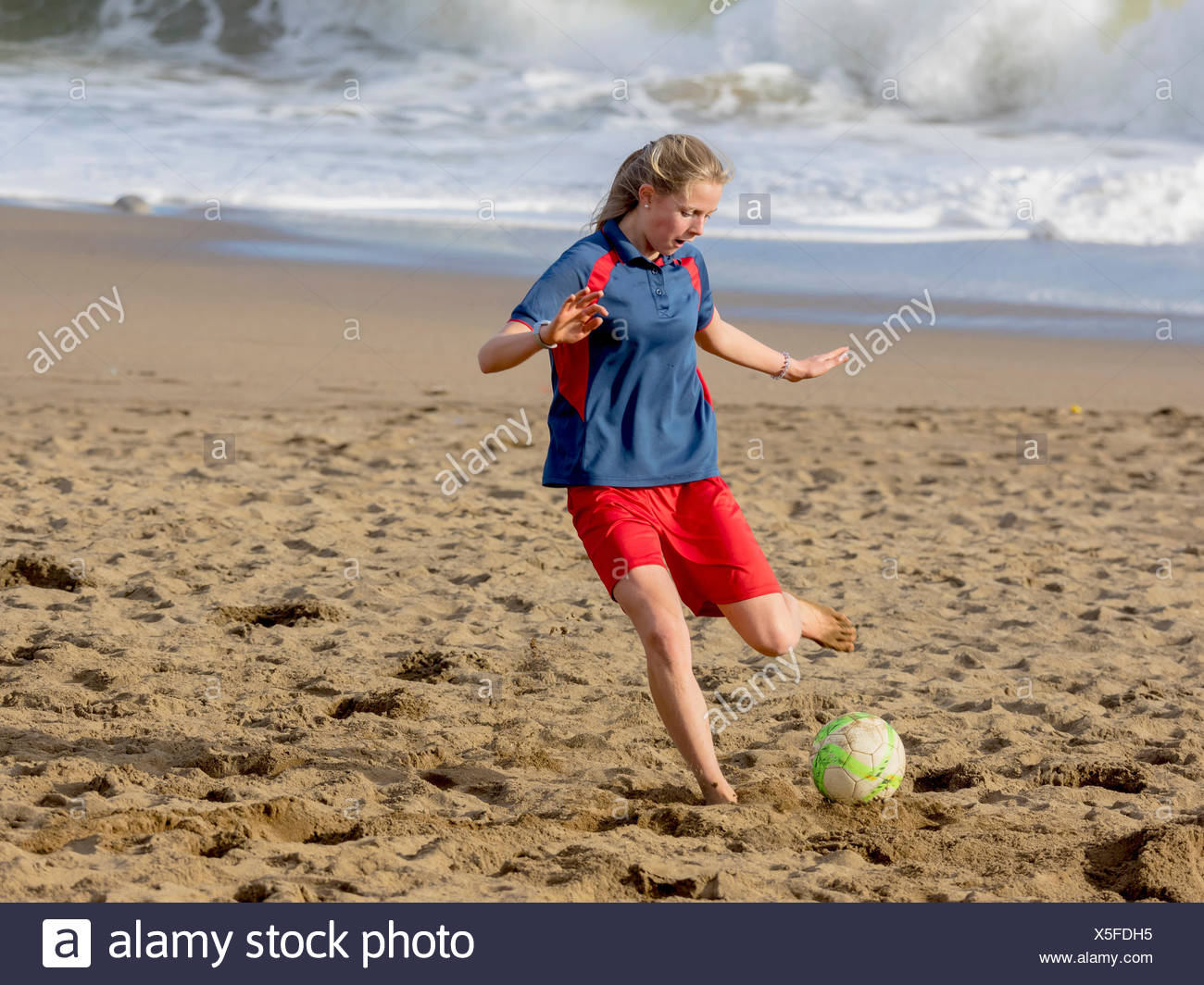 Soccer Ball Girl Kicking High Resolution Stock Photography and Images