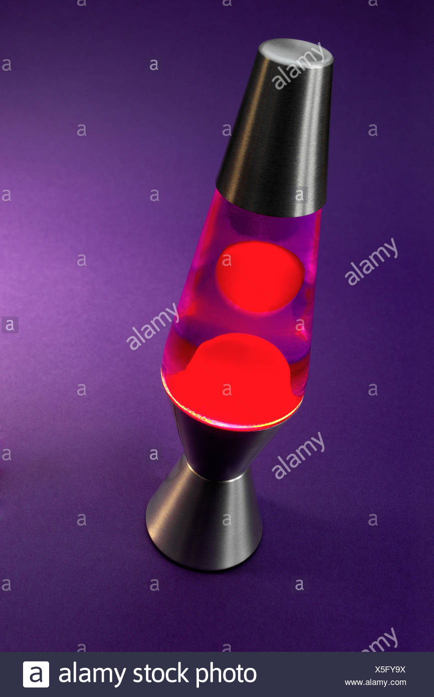Lava Lamp With Red Inside Shown Against Purple Background Stock Photo Alamy