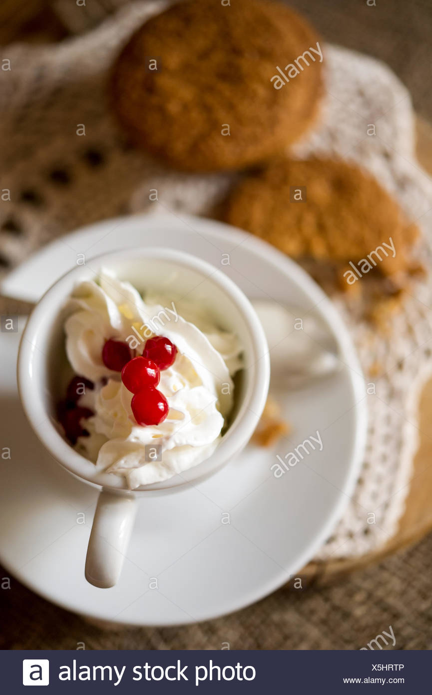 Oat biscuits with coffee and whipped cream Stock Photo: 278831078 ...