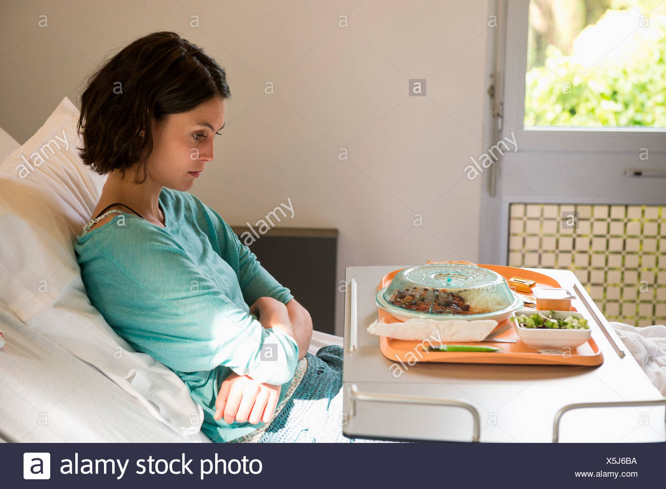 Anorexia Nervosa Patient With A Food Tray In Hospital Ward Stock Anorexia Nervosa Patient With A Food Tray In Hospital Ward