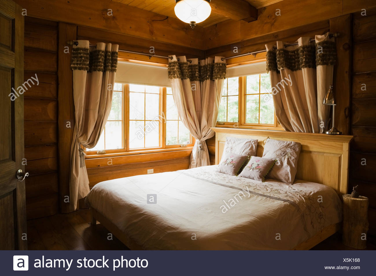 Master Bedroom Inside A Residential Log Home Built By Maison