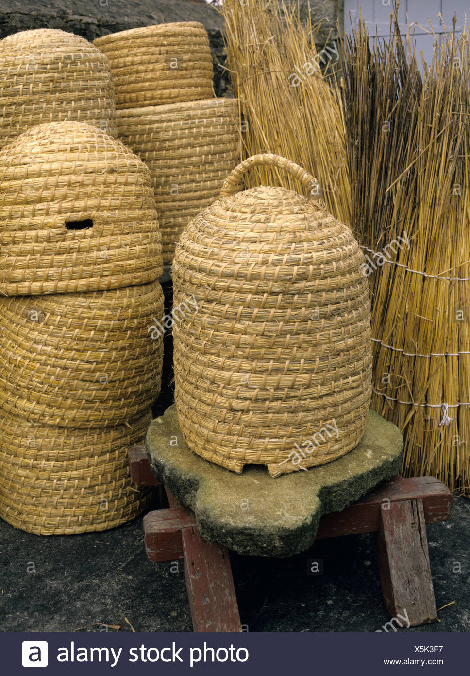 Bee Skep And Hives Being Made From Long Straw Stock Photo Alamy