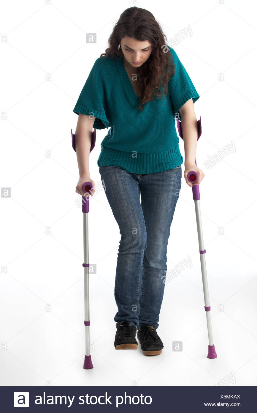 Girl Walking On Crutches Stock Photos & Girl Walking On Crutches Stock Images Alamy