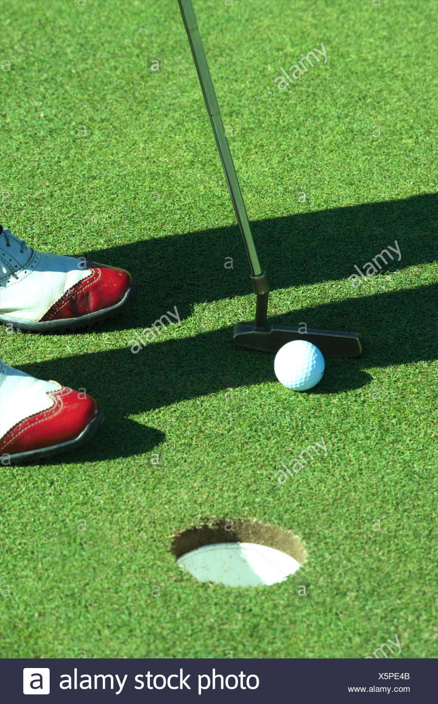 Hitting Golf Ball Stock Photos & Hitting Golf Ball Stock Images Alamy