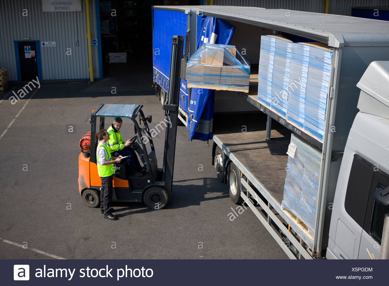 Forklift Loading Lorry Stock Photos & Forklift Loading Lorry Stock