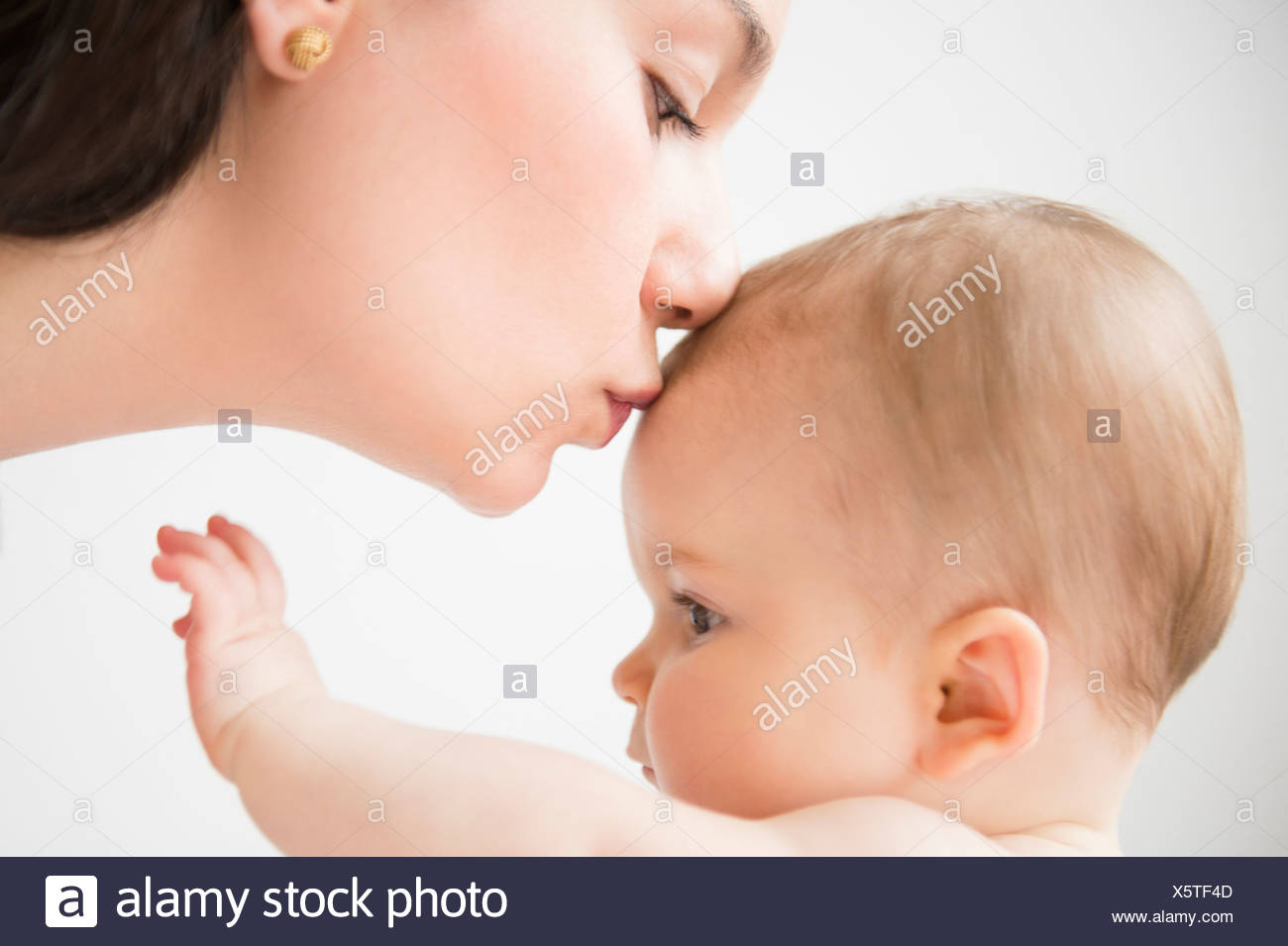 baby kiss mom