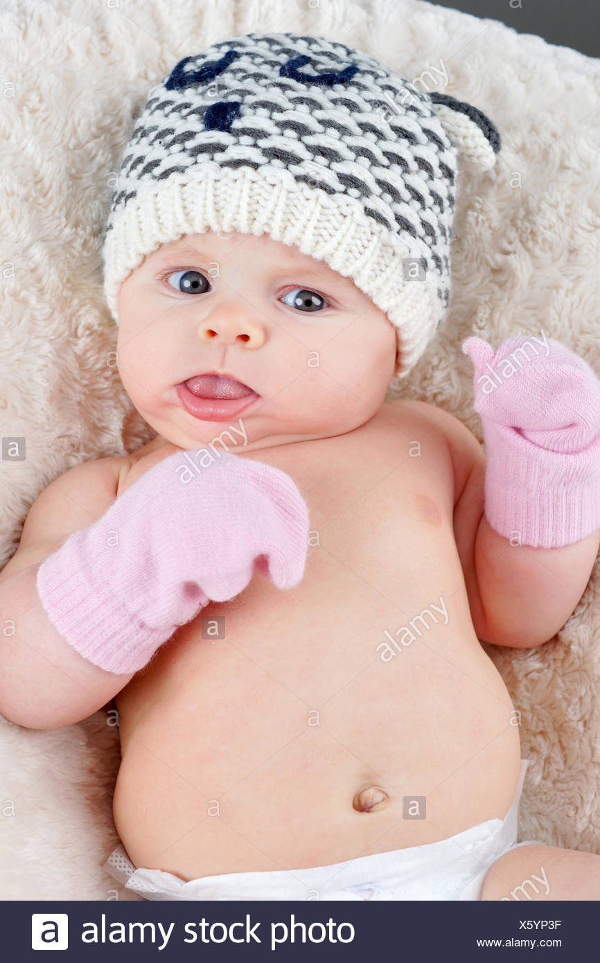 baby with mittens