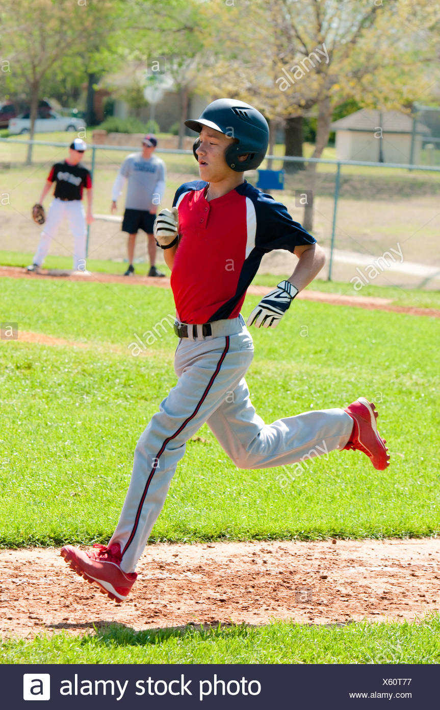 boy in baseball uniform