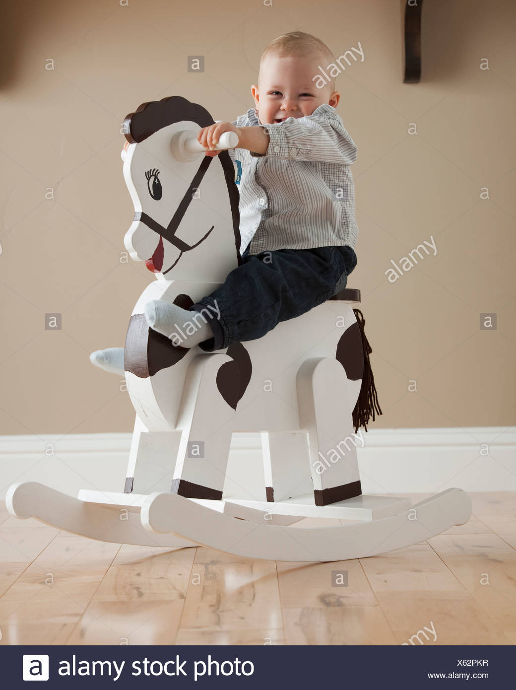 baby on rocking horse