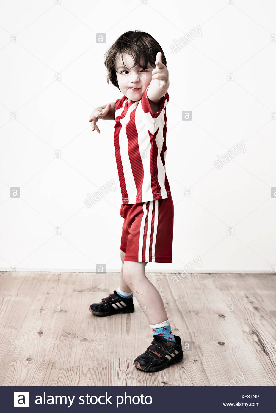 boy red and white striped shirt