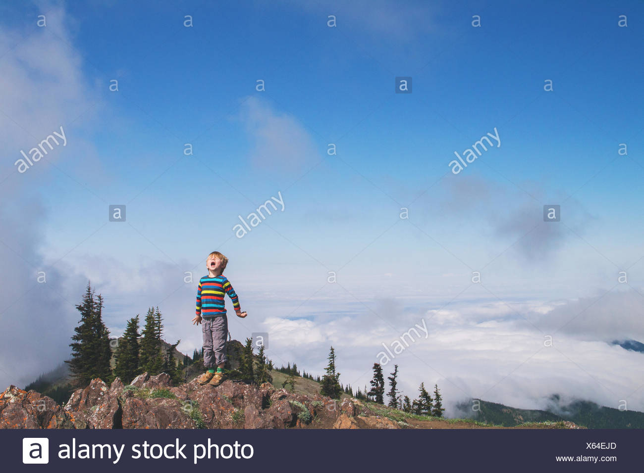 Standing On Top Of A Mountain High Resolution Stock Photography and ...