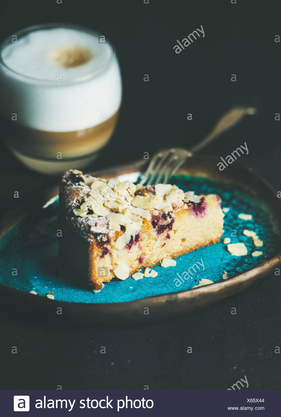 Dessert And Coffee Piece Of Lemon Ricotta Almond And Raspberry Gluten Free Cake And Glass Of Latte Over Dark Wooden Background Selective Focus Ve Stock Photo Alamy