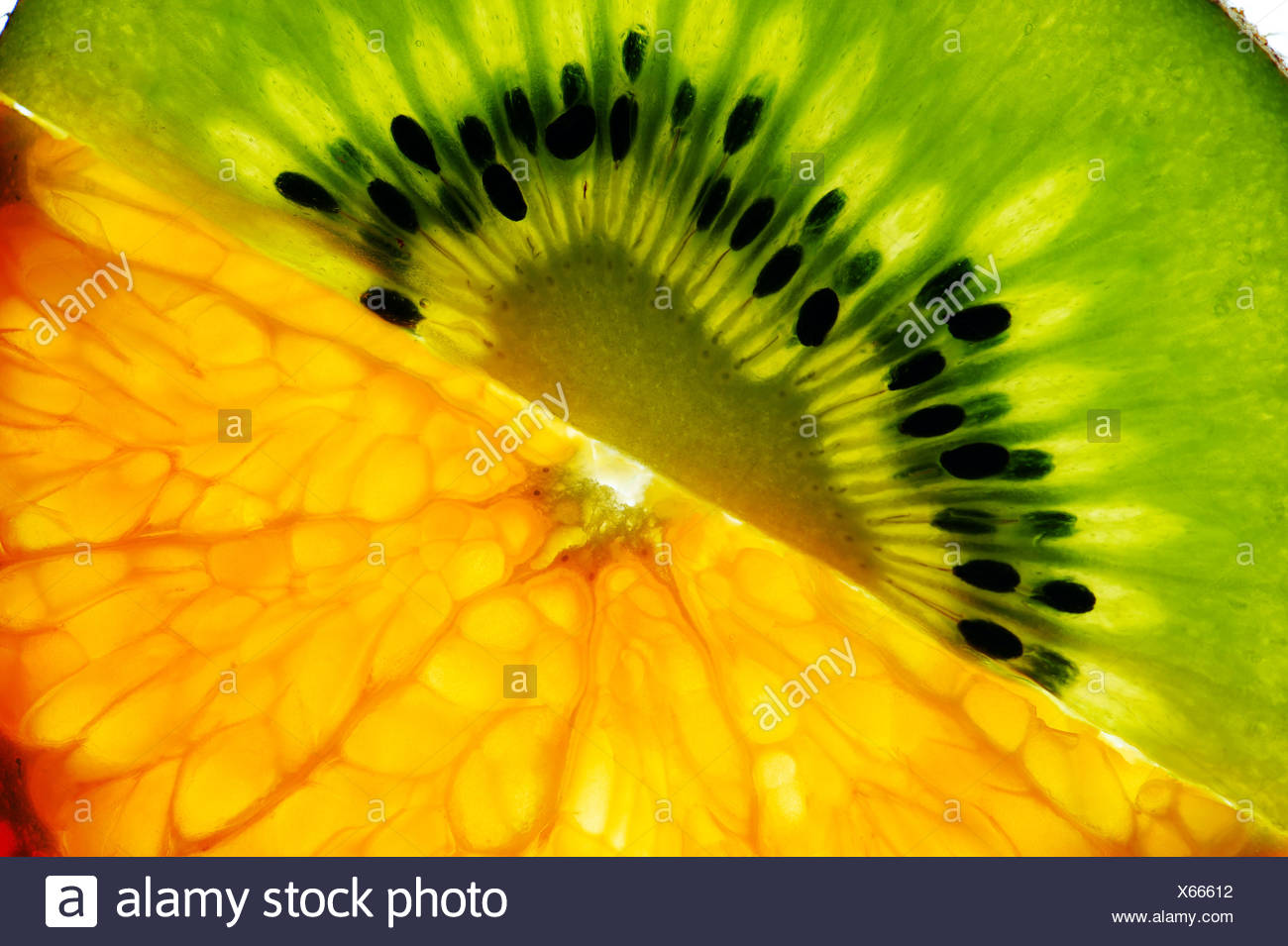 Sliced kiwi and mandarin Stock Photo