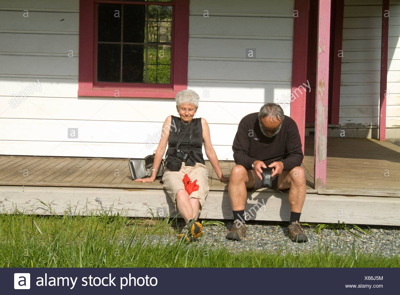 Older Couple Sitting On Porch Stock Photos & Older Couple Sitting On
