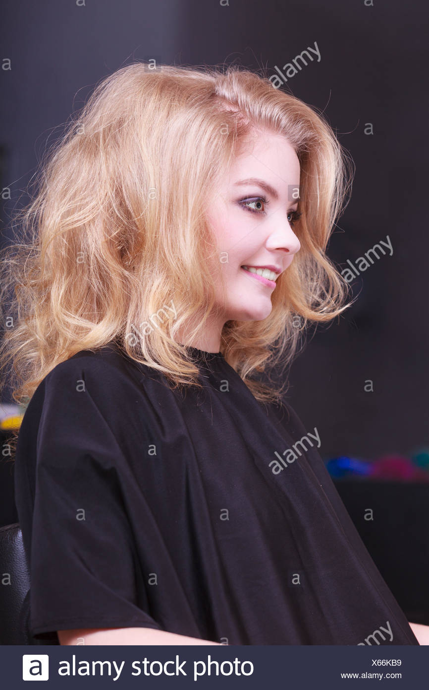 Beautiful Smiling Girl With Blond Wavy Hair By Hairdresser Young