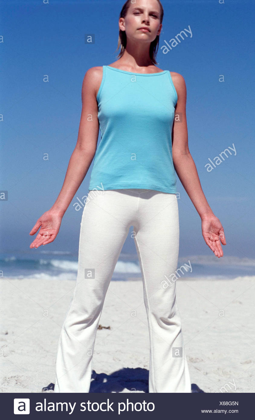 Tanned Female Wet Chin Length Blonde Hair Wearing Subtle Make Up