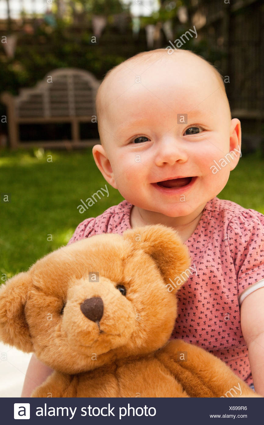 baby girl with teddy