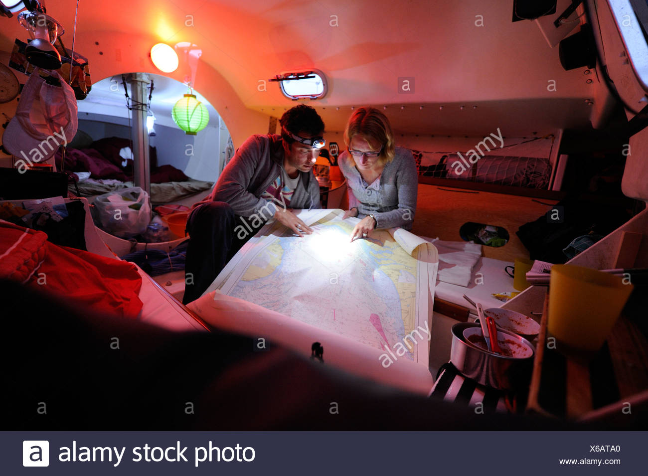 Couple Inside Sailboat Stock Photos Couple Inside Sailboat Stock