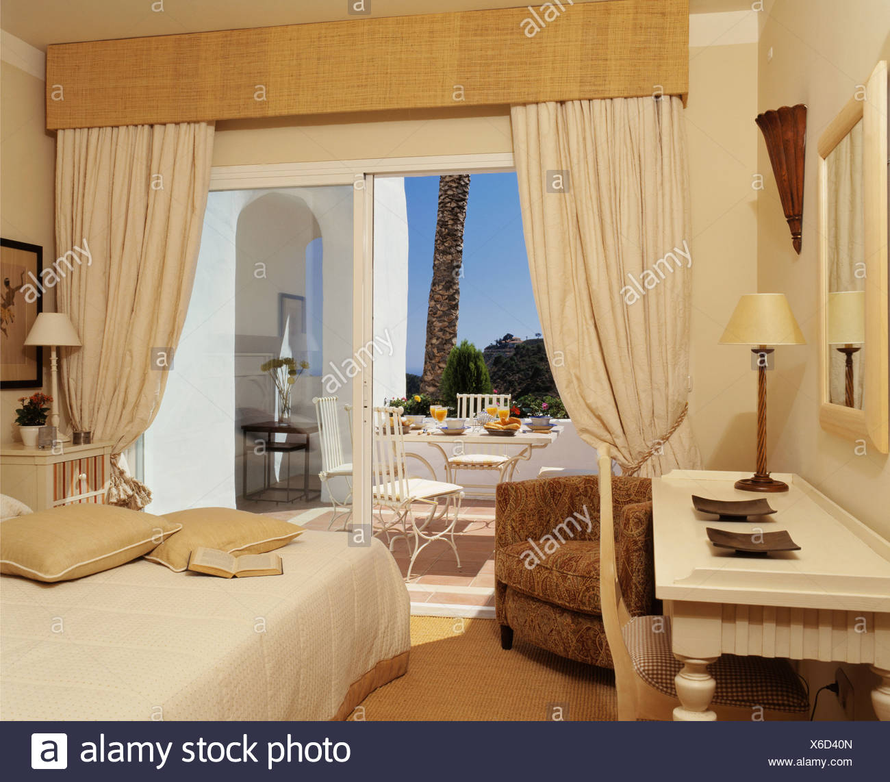 Pelmet And Cream Drapes On Glass Doors To Terrace In Spanish Villa