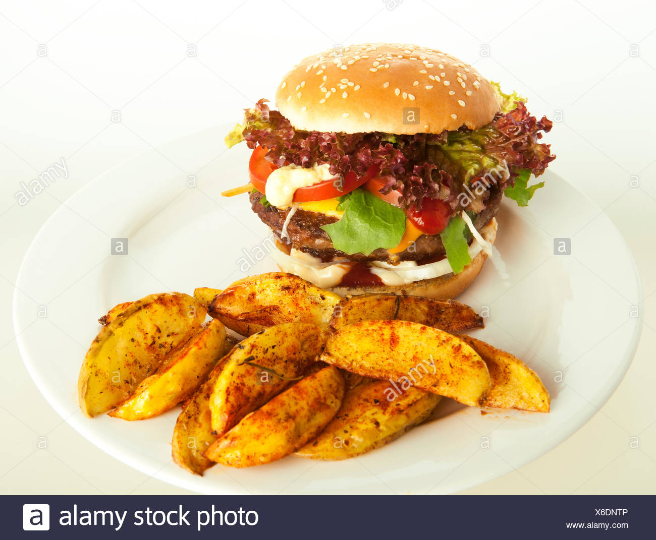 Cheeseburger With Potato Wedges On Plate Green And White Striped