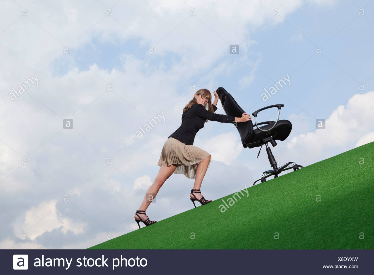 Young Woman Pushing Chair High Resolution Stock Photography and Images