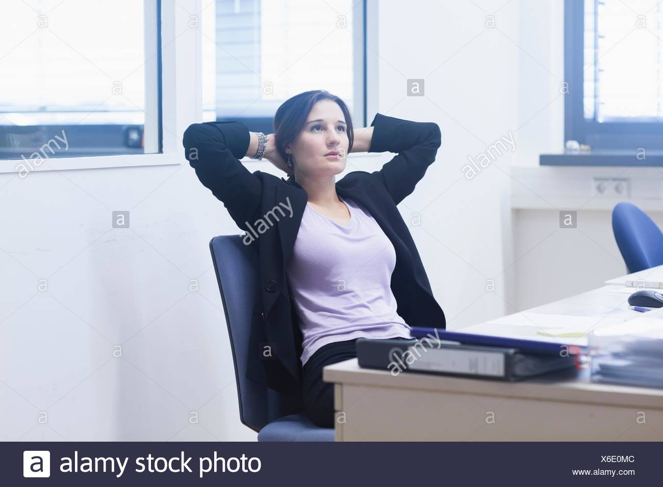 Businesswoman Leaning Back Office Chair High Resolution Stock Photography And Images Alamy