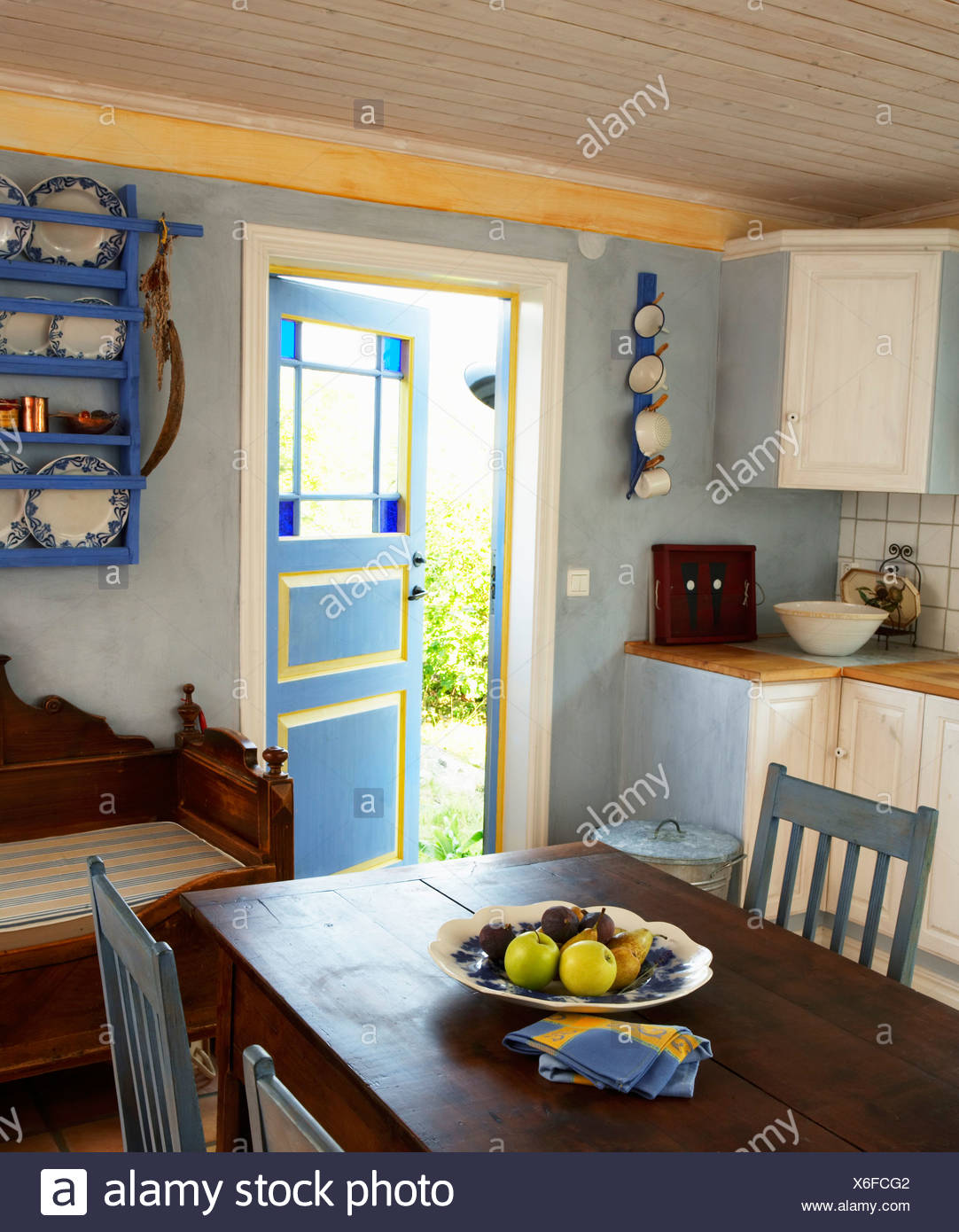 Kitchen With Door Open To Outside Kitchen With Door Open To Outside