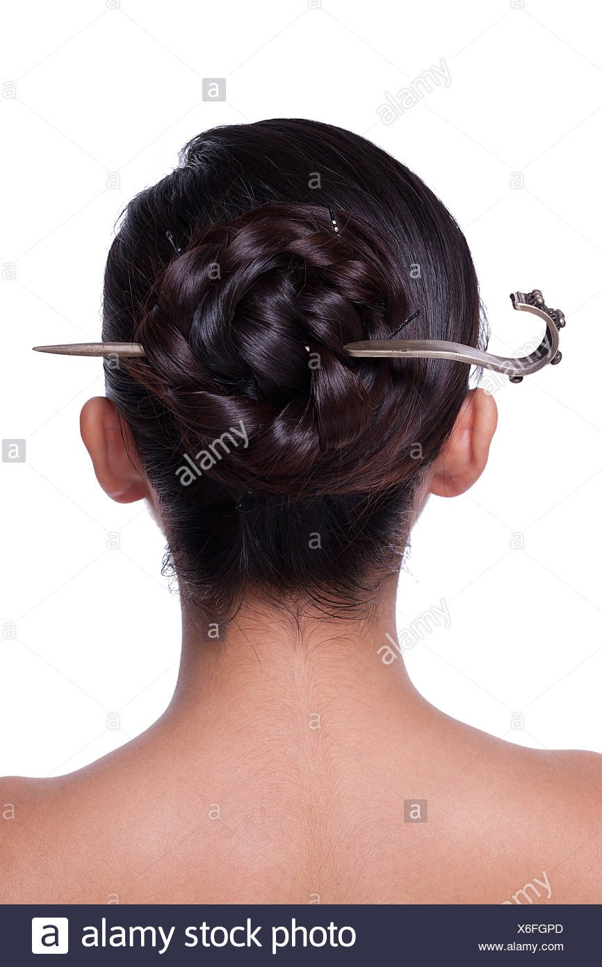 Young Lady Tied Up Hair With Chinese Hairpin Stock Photo