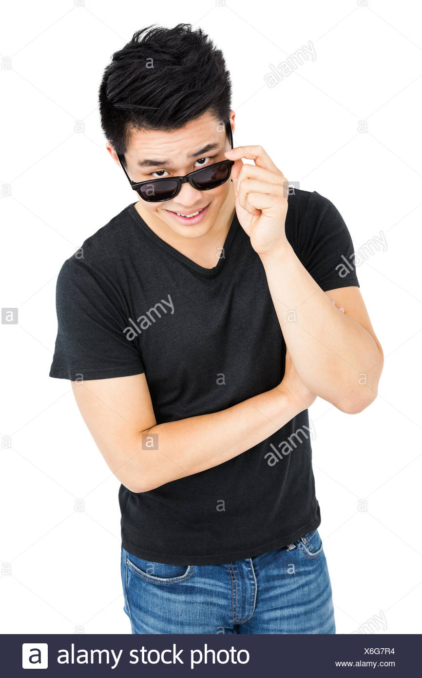 Young Man Looking Over His Sunglasses Stock Photo Alamy Young Man Looking Over His Sunglasses Stock Photo Alamy