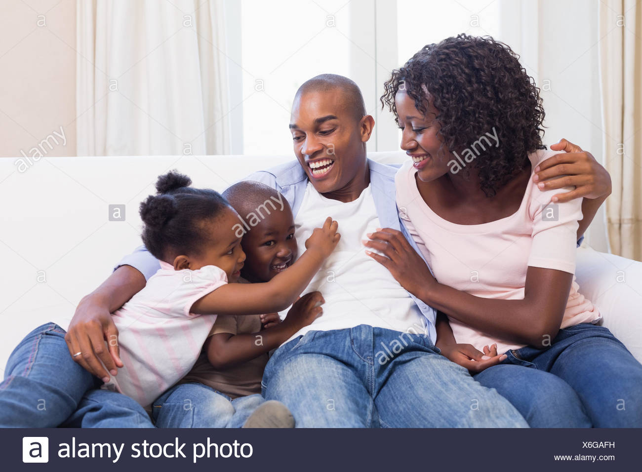 Black Family Laughing High Resolution Stock Photography and Images - Alamy