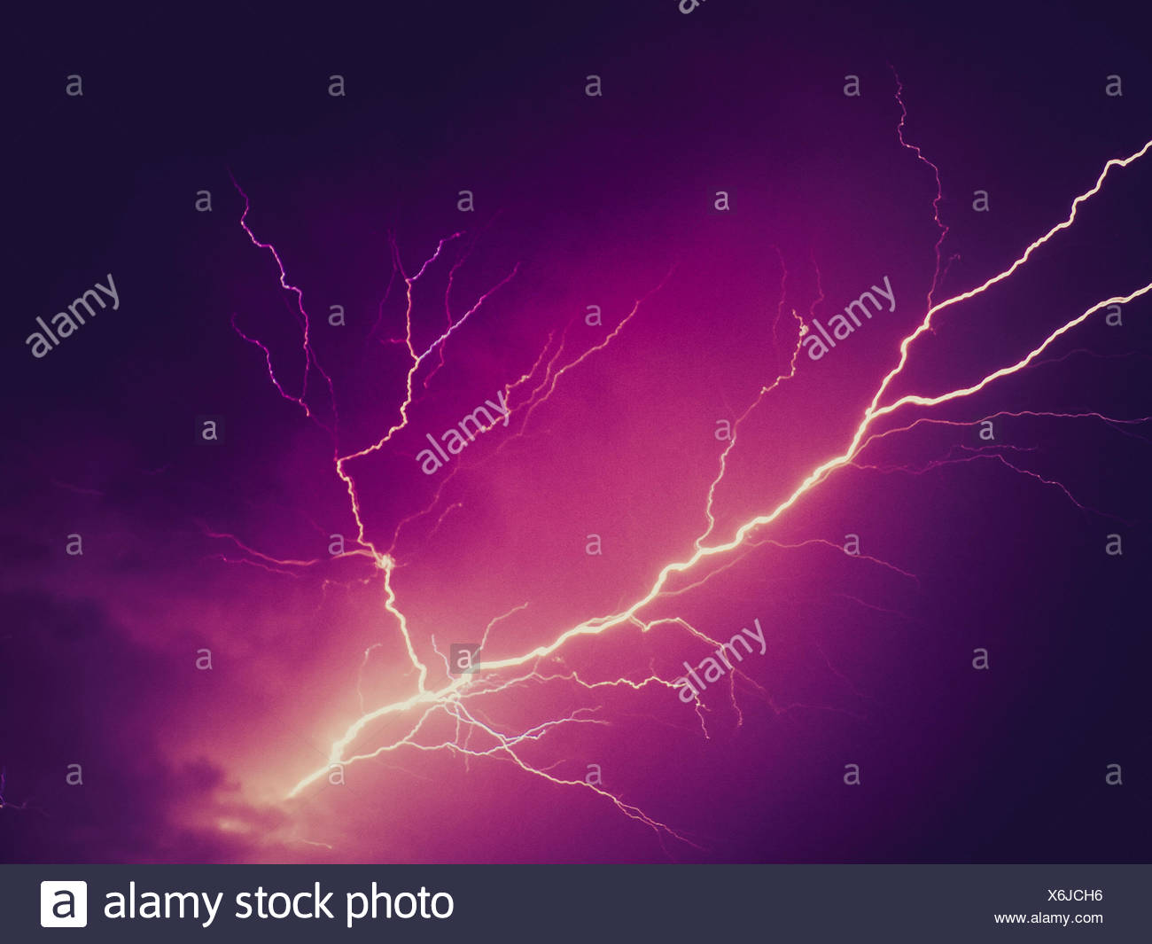 Vintage Looking Bright Lightning Bolt Over Dark Violet Sky Stock Photo Alamy