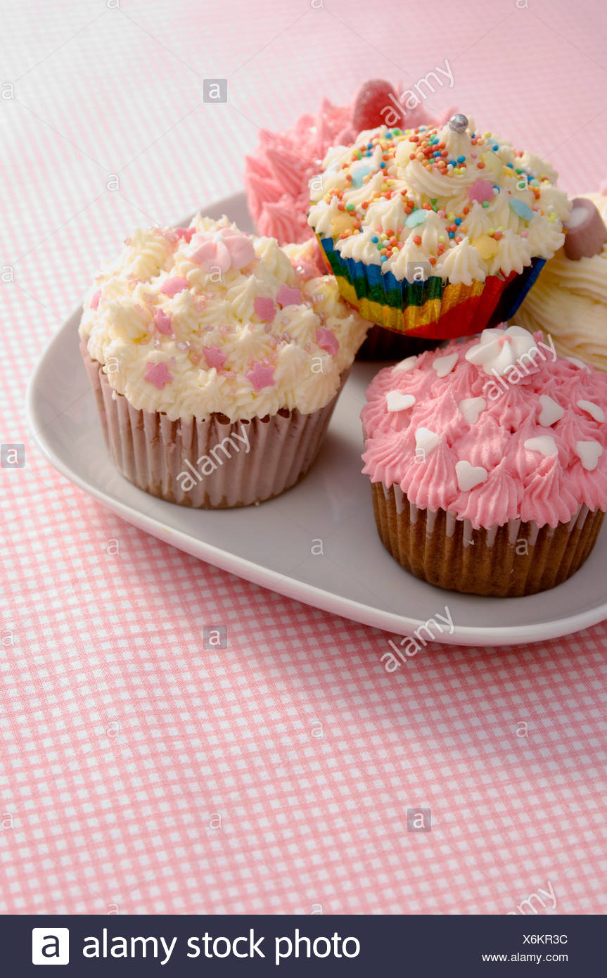 An English Cream Tea Cupcakes Decorated With Icing And Sprinkles An English Cream Tea Cupcakes Decorated With Icing And Sprinkles