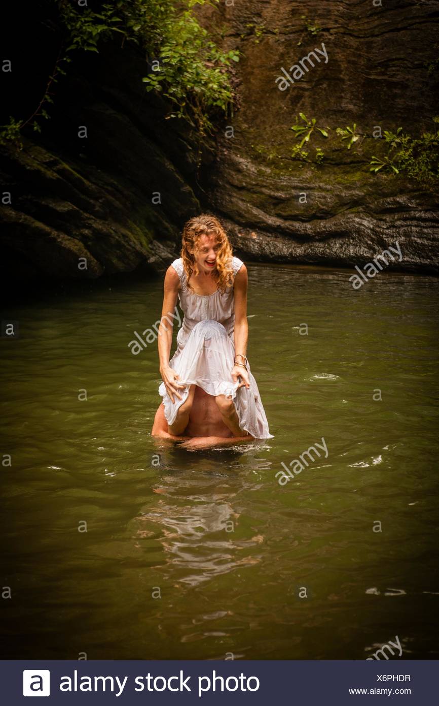 Woman Wearing Dress In Water High Resolution Stock Photography and ...
