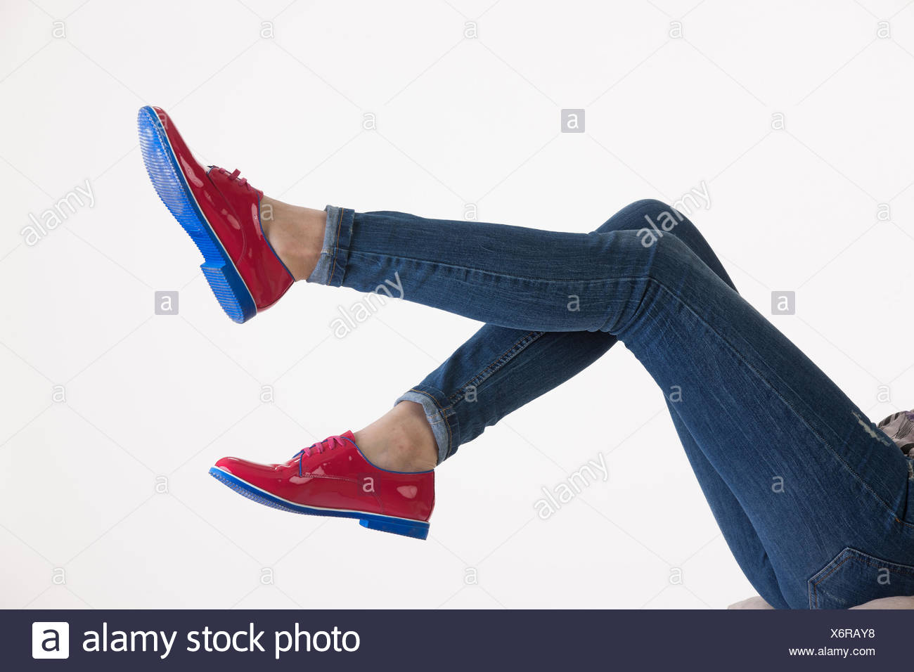 blue jeans with red shoes