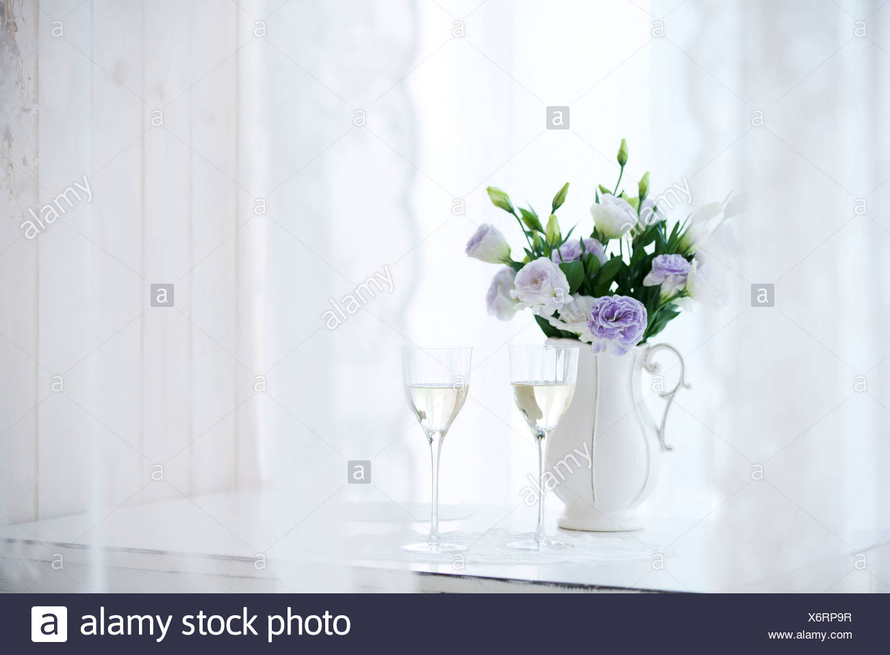 Close Up Of Wine Glasses With Flower Vase Stock Photo 279576243