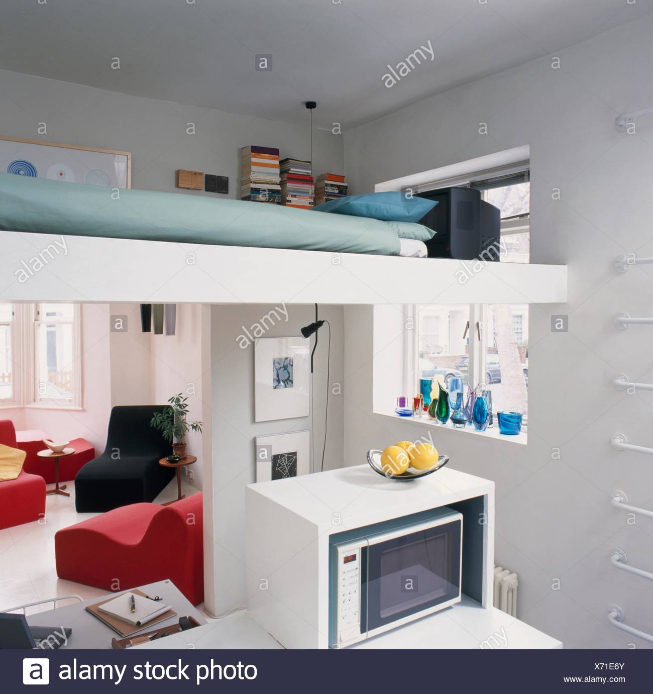 Two Room Apartment With Living Desk And Bed Above