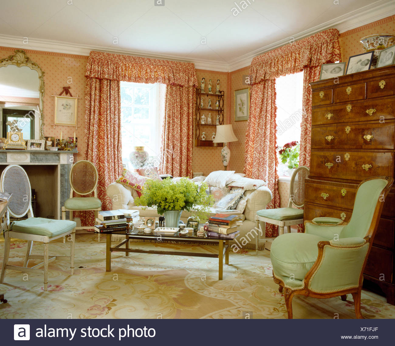 Red White Curtains In Pink Country Living Room With Antique Balloon Back Chairs And Comfortable Armchair And Sofa Stock Photo Alamy