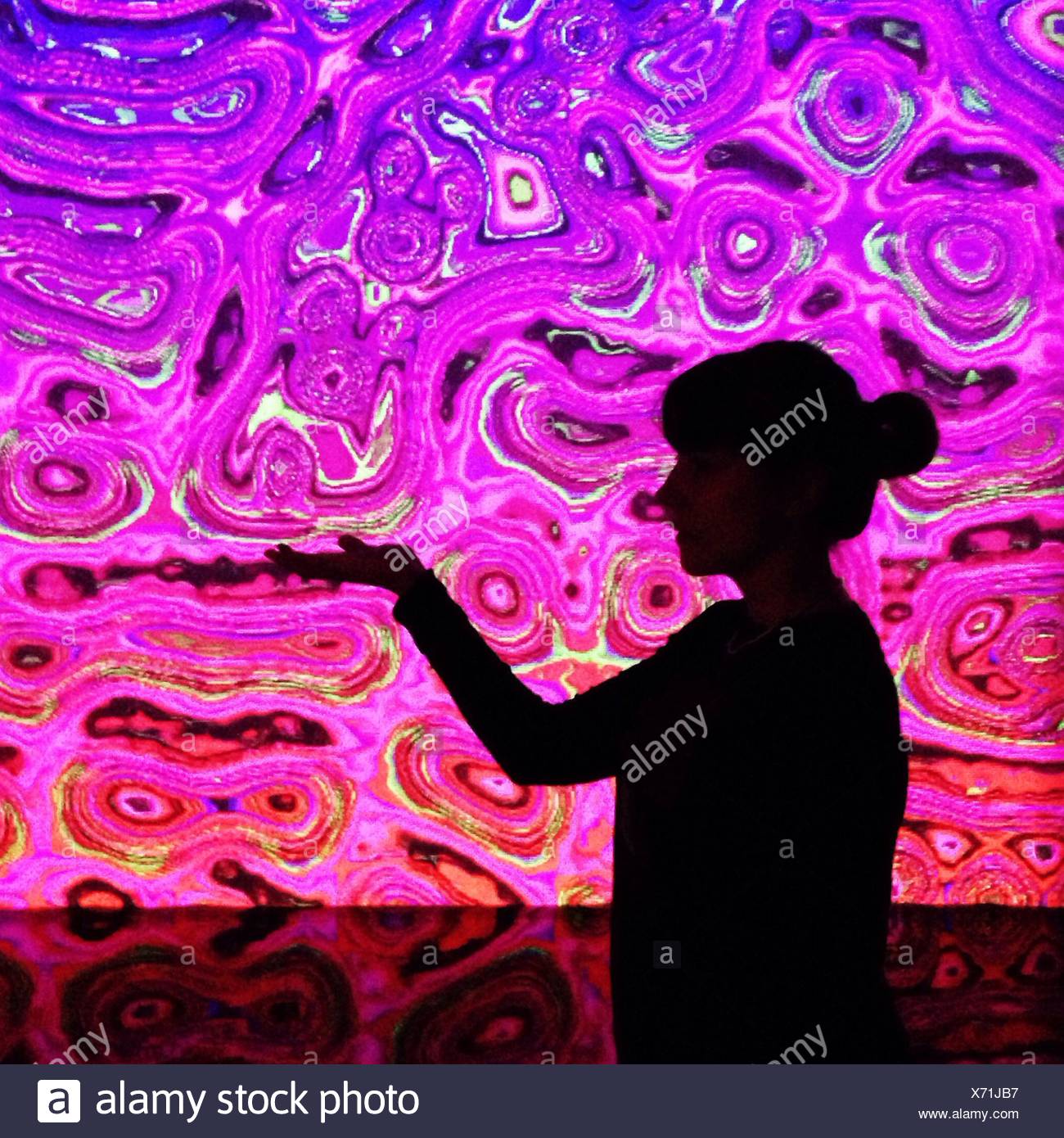 Woman With Biological Pattern Backdrop Stock Photo