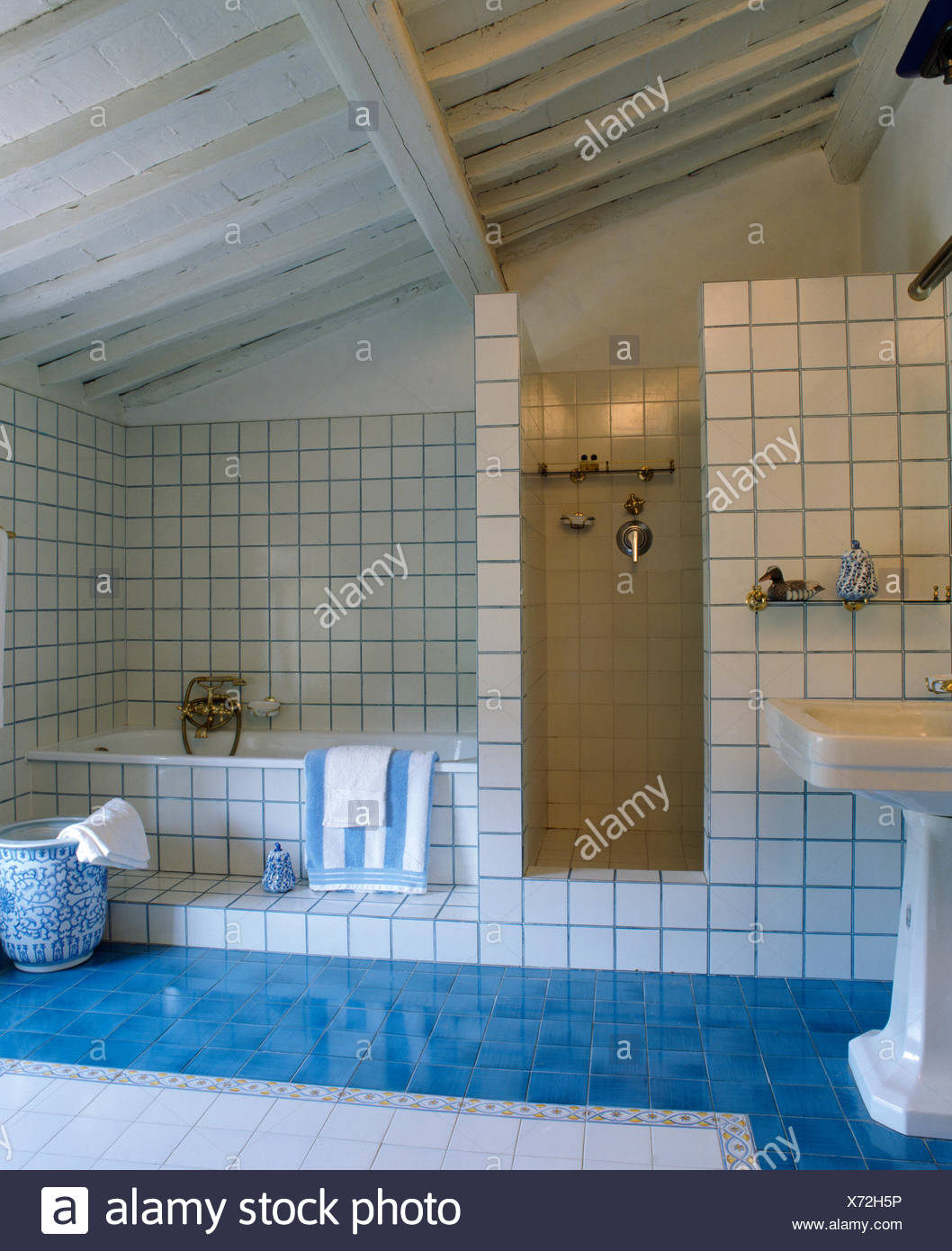 Aquamarine Blue Tiled Floor In Modern White Tiled Tuscan