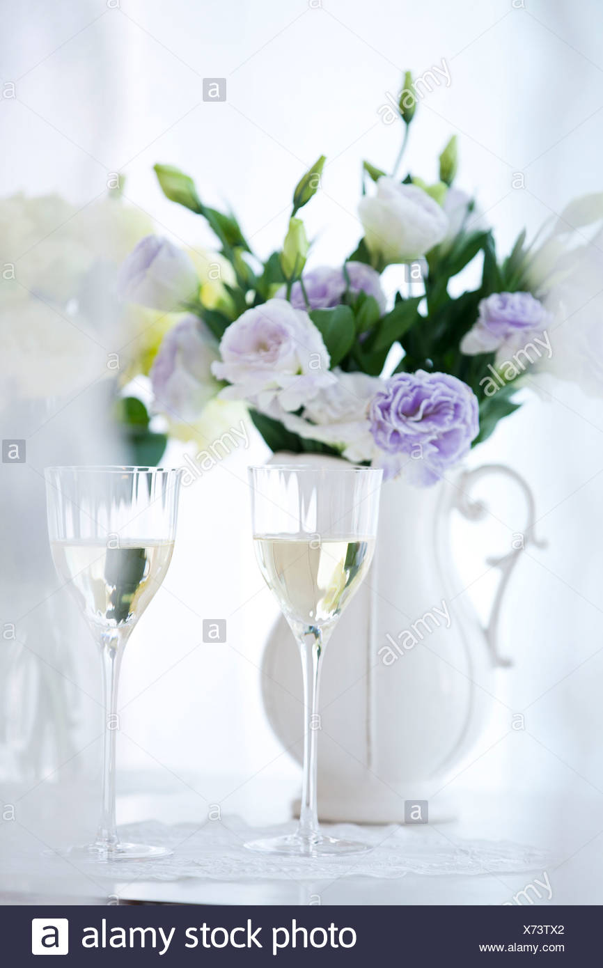 Close Up Of Wine Glasses With Flower Vase Stock Photo 279753882