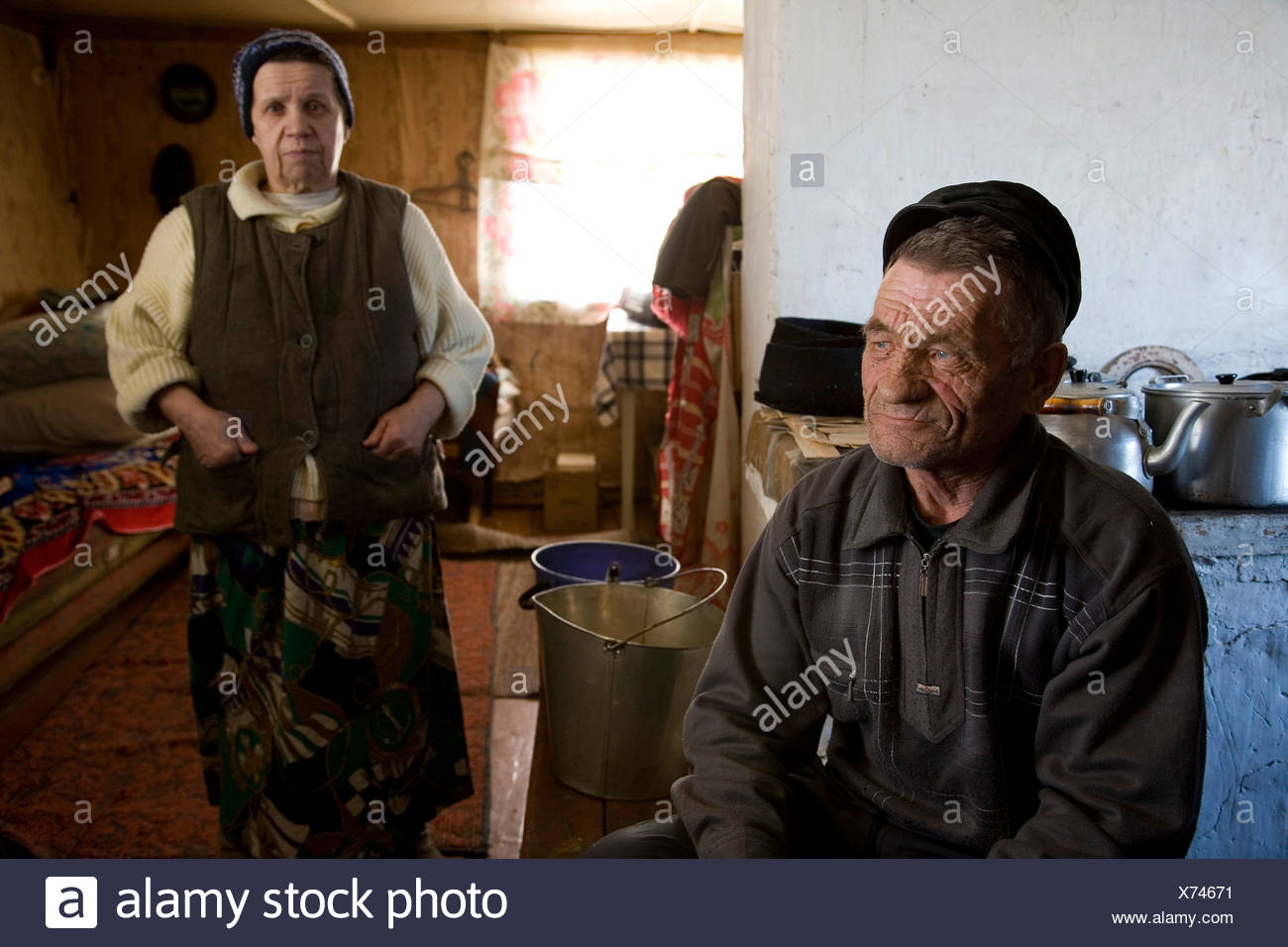 Peasant couple at their home in Karelia, Russia Stock Photo