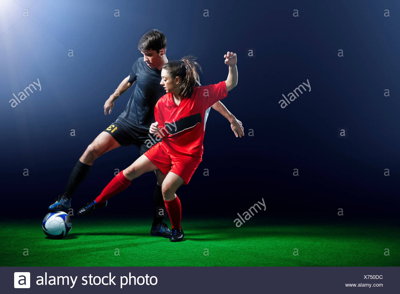 Female Playing Football High Resolution Stock Photography and Images