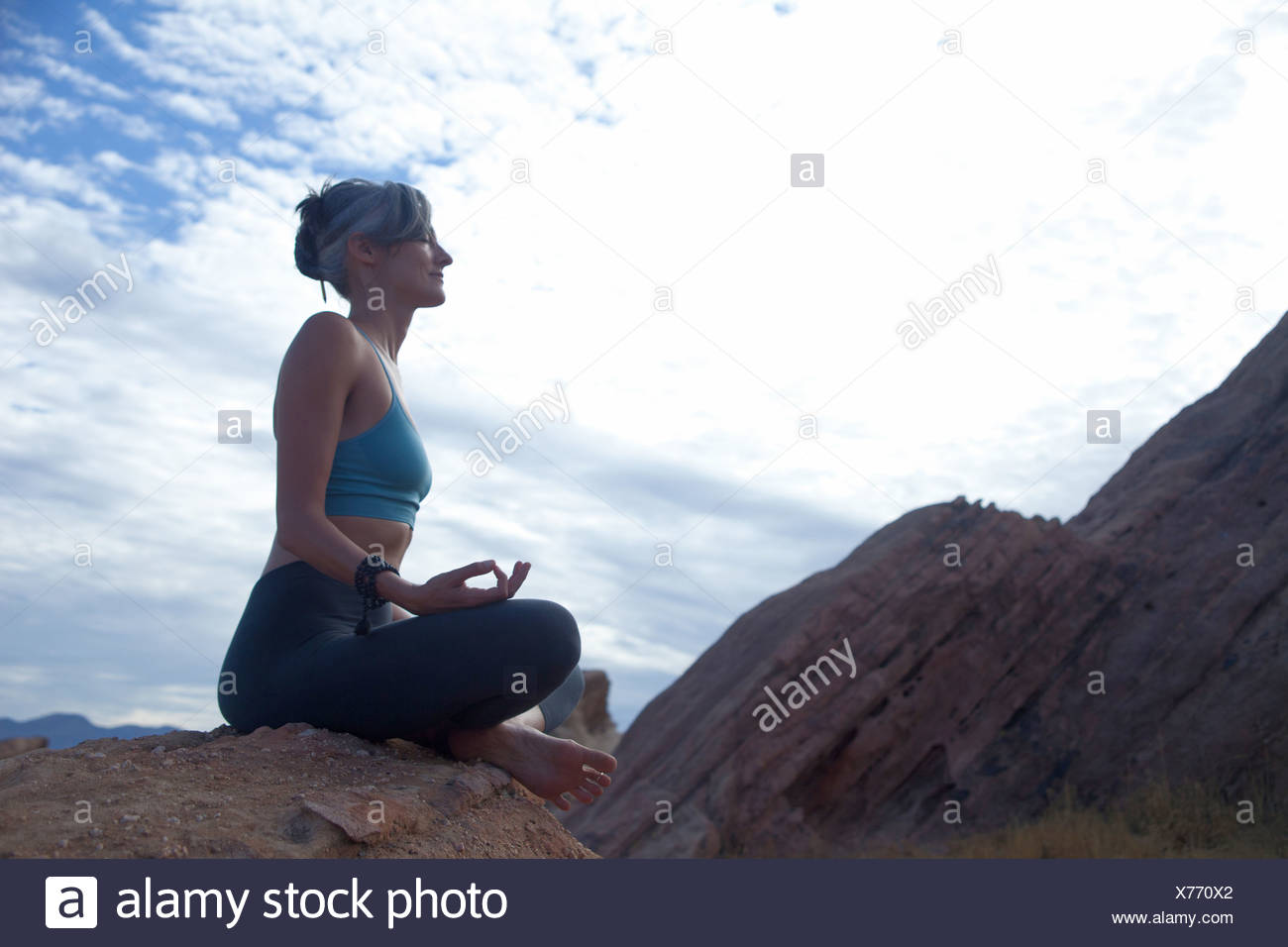 Mature Woman Sitting Legs Crossed High Resolution Stock Photography and ...