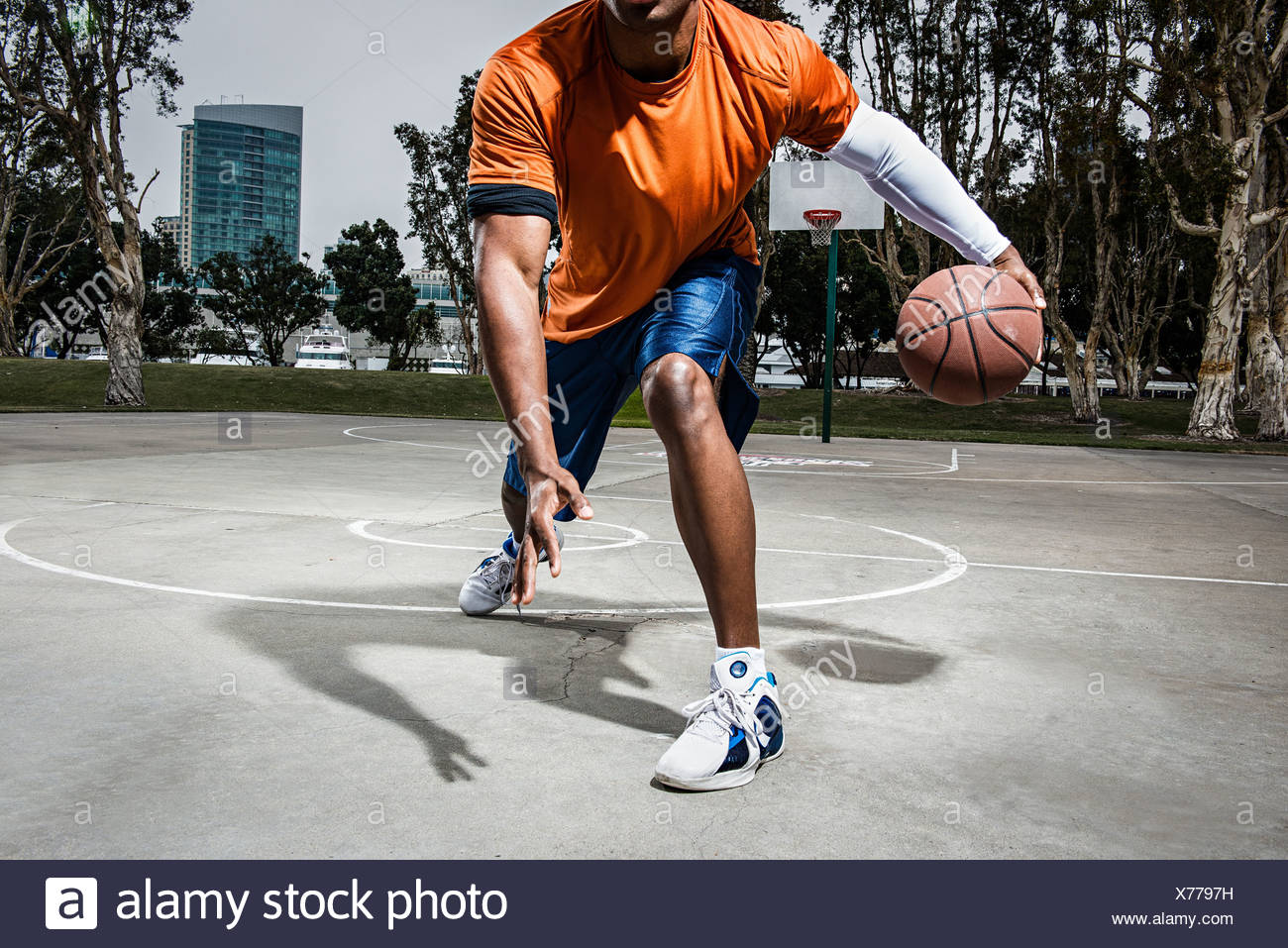 Young Man Playing Basketball On Court Close Up Stock Photo Alamy