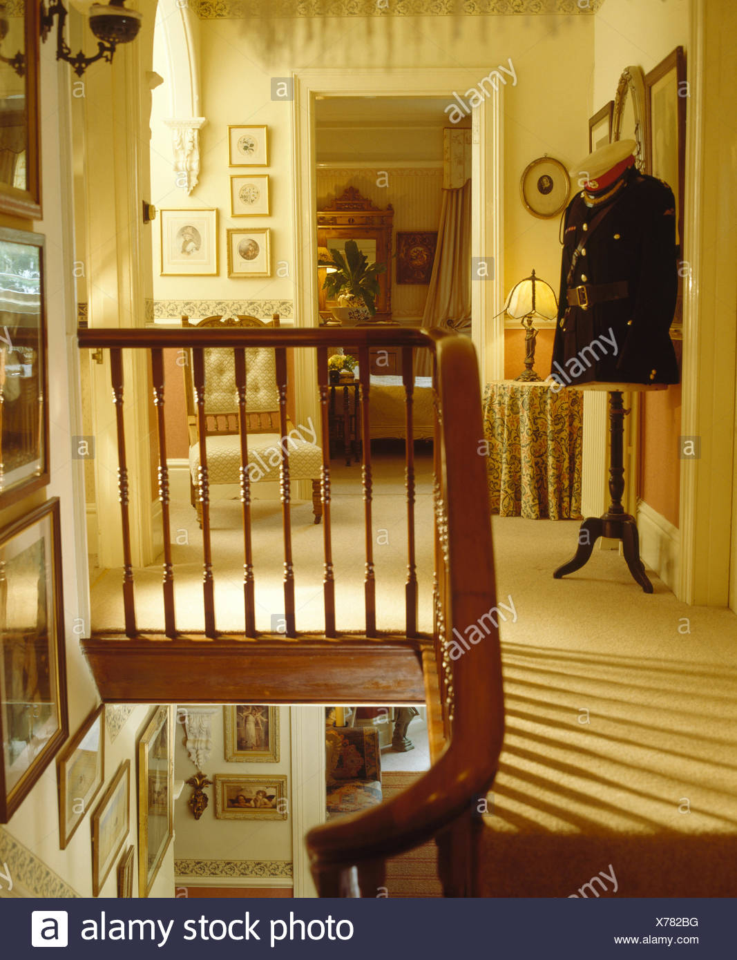 Spindle Turned Banisters On Landing With Cream Carpet Stock Photo